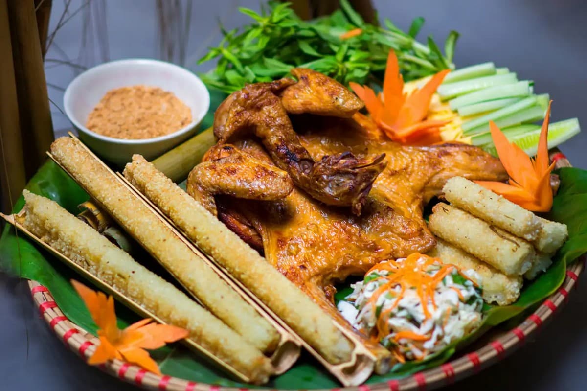 Must-Try Delicacies at Cam Luong Fish Stream: Bamboo-Tube Rice with Grilled Chicken