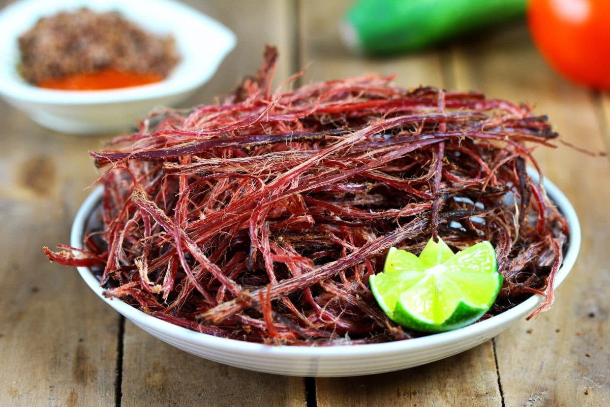 Smoking buffalo meat is a famous dish in Cat Cat Village