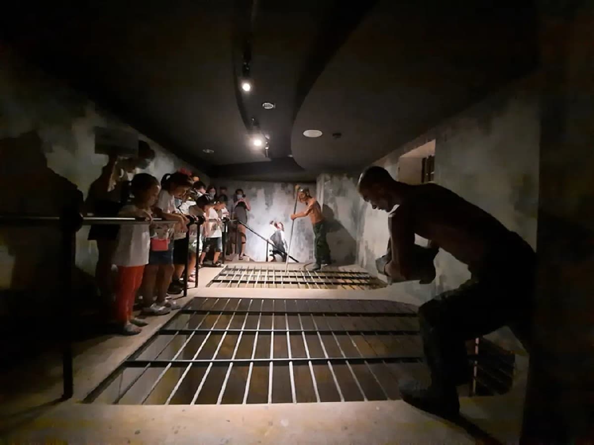Tourists visit the tiger cages at Con Dao Prison