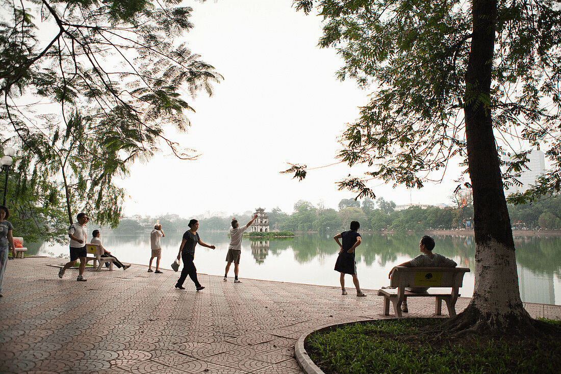 Top things to do in Hanoi Vietnam: People Watch at Hoan Kiem Lake