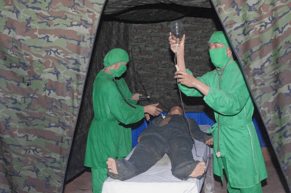 Wax statues of doctors and suffers in Cu Chi Tunnels, which displays the rough period of Vietnam War