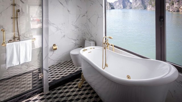 Ambassador Cruise Suite Bathroom with Oval Bathtub