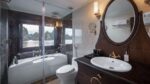 Athena Luxury Cruise Suite Modern Bathroom with Long Bathtub