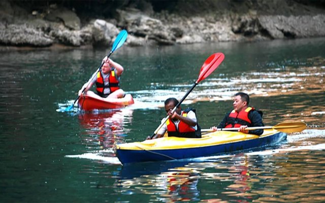 Calypso Cruise Kayaking on The Tranquil Water of Halong Bay