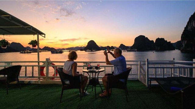 Cozy Bay Cruise Couple Admiring Sunset on Bay