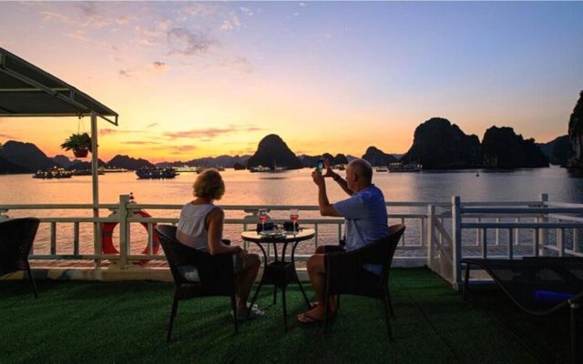 Cozy Bay Cruise Couple Admiring Sunset on Bay