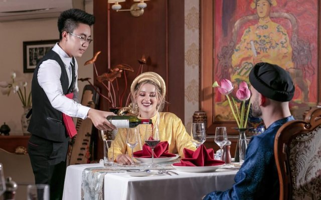 Emperor Cruise Couple Having a Sweet Diner in the Elegant Restaurant