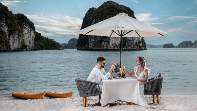 Emperor Cruise Couple Having A Meal on Sandy Beaches