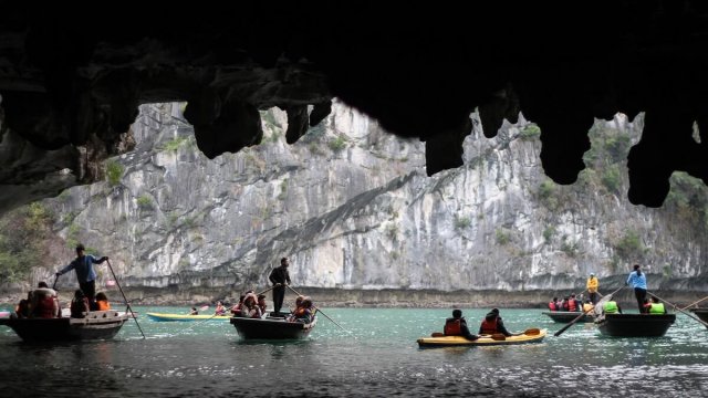 Mon Cheri Cruise Bamboo Boat in Dark and Bright Cave
