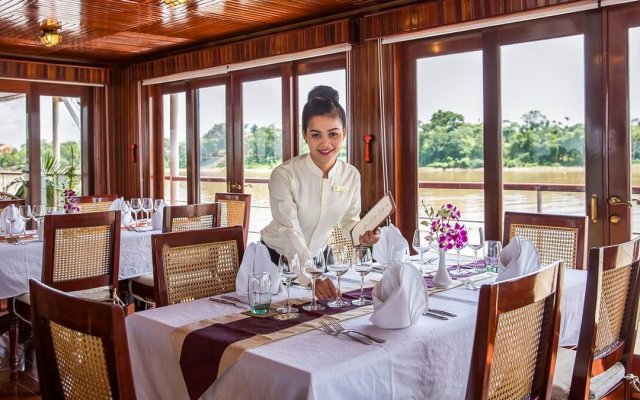 Pandaw Halong Cruise Beautiful Staff Prepares Dinning Table
