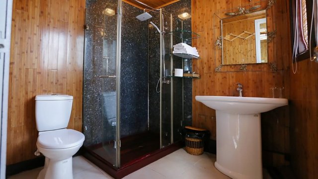 Petit White Dolphin Cruise Bathroom Offers Standing Bath and Fulfillment