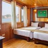 Petit White Dolphin Cruise Compliment Drink in Twin Beds Room