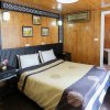 Petit White Dolphin Cruise Deluxe Double Cabin with Ancient Decor