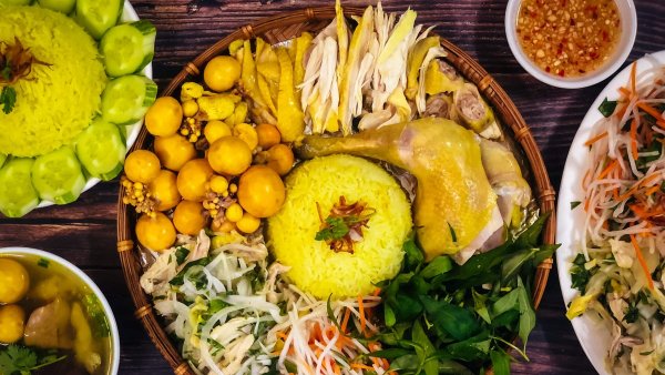 Best Local Food in Hoi An - Com Ga Hoi An is a delicious Hoi An-style chicken rice with tender, flavorful chicken