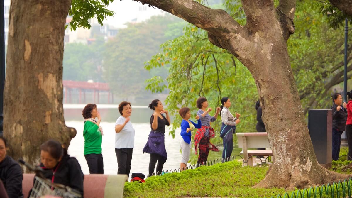 Hanoi Travel Guide: Things to Do in Hanoi - People watch at Hoan Kiem Lake
