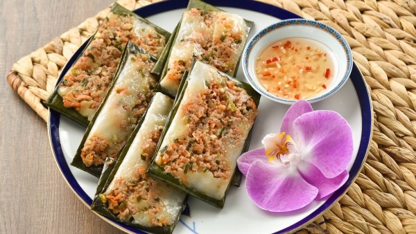 Banh Nam is a Vietnamese steamed flat rice dumpling filled with savory ingredients