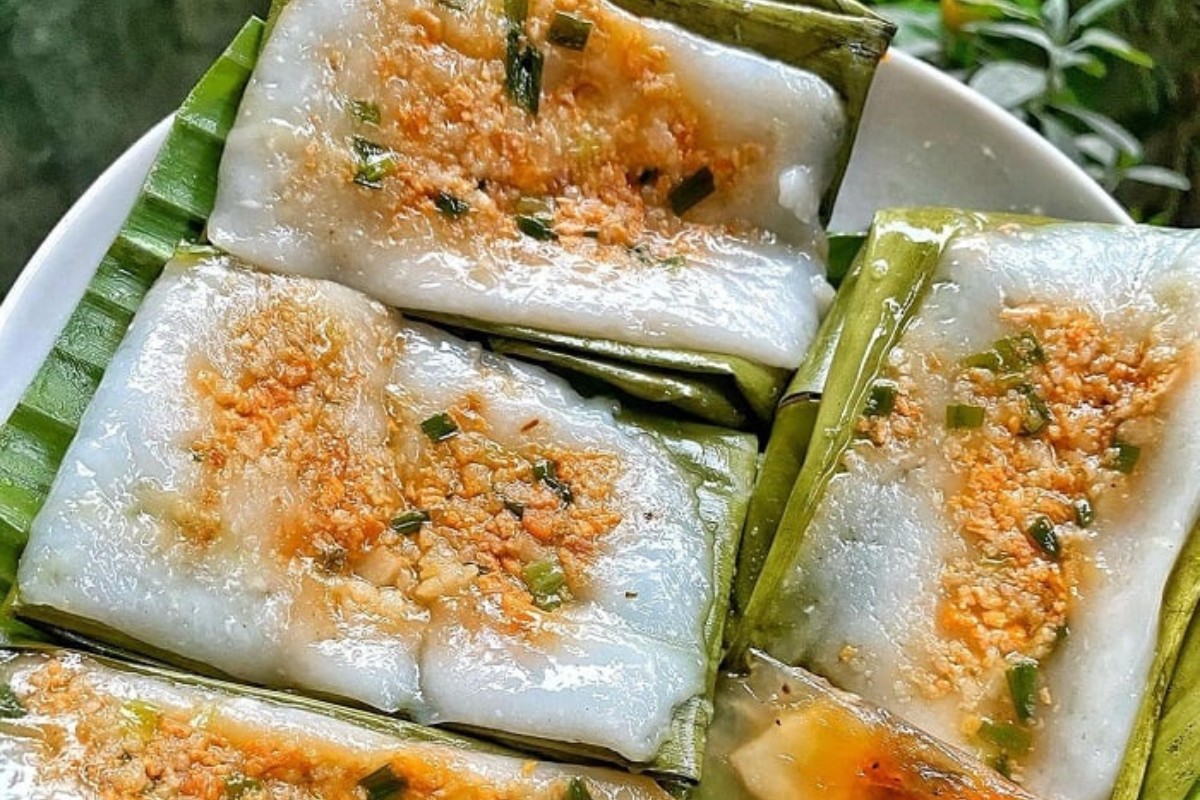Banh Nam typically features rice flour, shrimp, pork, aromatic herbs, and banana leaves