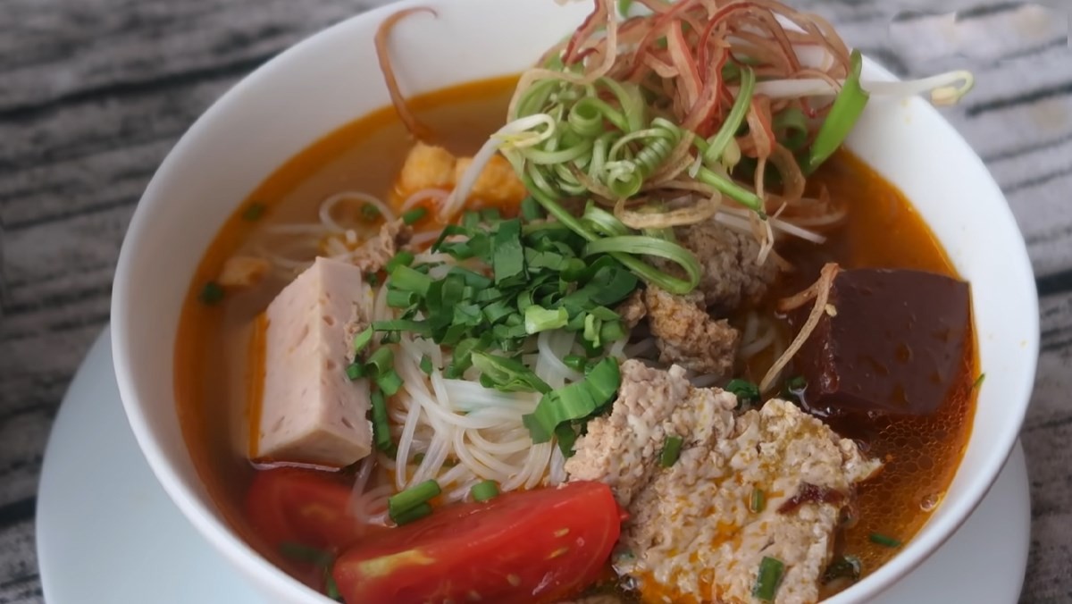 Best Local Food in Saigon - Bun Rieu Cua's broth is what makes this dish so special and unforgettable