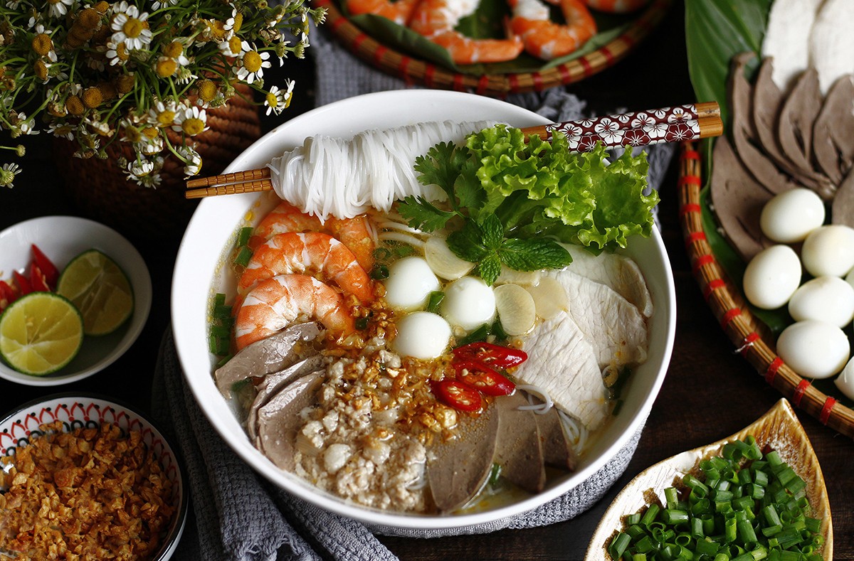 Best Local Food in Saigon - Hu Tieu, a popular noodle dish in Saigon, is a harmonious blend of flavors