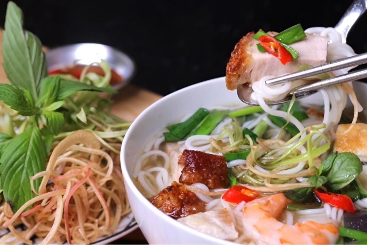 Bun Mam features a flavorful broth made from fermented fish sauce, complemented by seafood and noodles