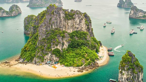 Explore Hanoi to Halong Bay Day Tour, featuring Titop Island and Luon Cave highlights
