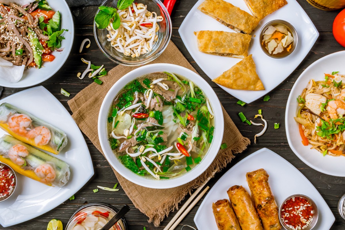Vietnam Tours Vietnam's cuisine entices with flavorful dishes, rich in herbs, spices, and cultural influences