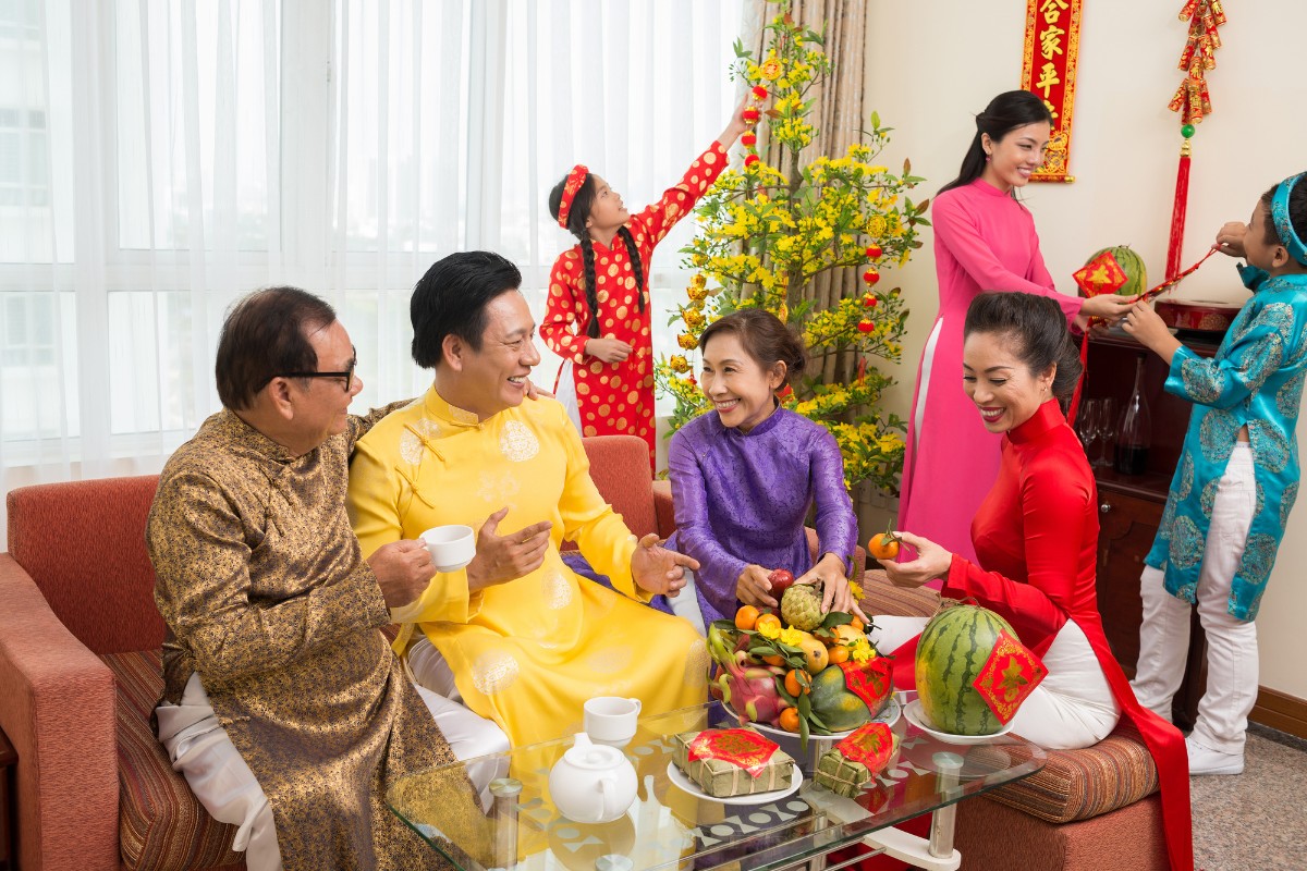 Vietnamese Ao Dai During Tet Holiday, wearing Ao Dai reflects cultural pride and enhances the festive atmosphere