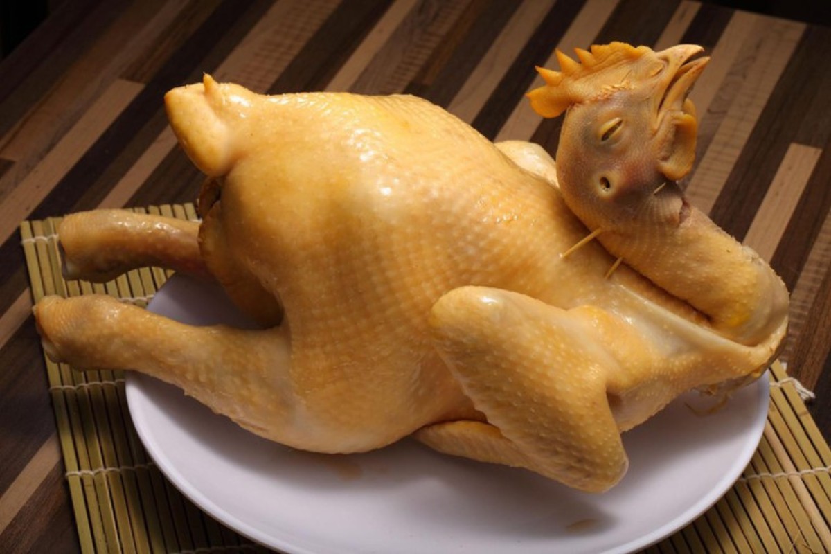vietnamese new year food Ga luoc is boiled chicken that symbolizes family togetherness