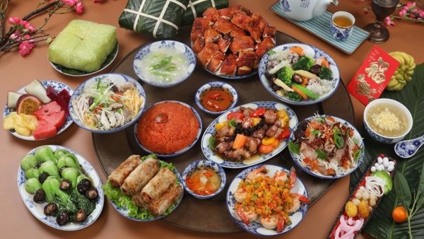 vietnamese new year food Tet feasts vary regionally, featuring traditional elegance in the North, preservation in the Central, and diversity in the South