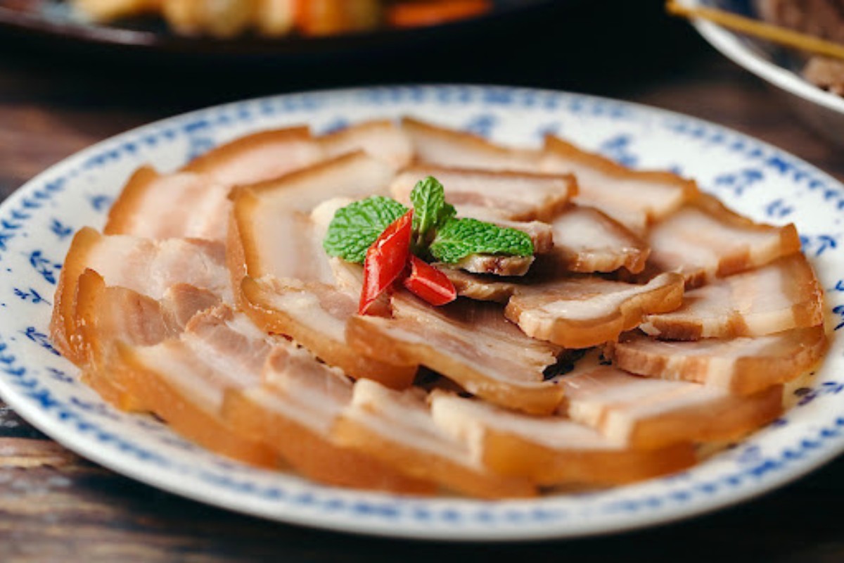 vietnamese new year food Thit heo ngam mam is pork marinated in fish sauce
