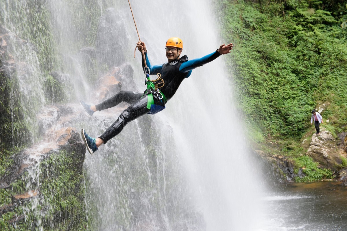 Experience the thrilling swing adventure at Love Waterfall