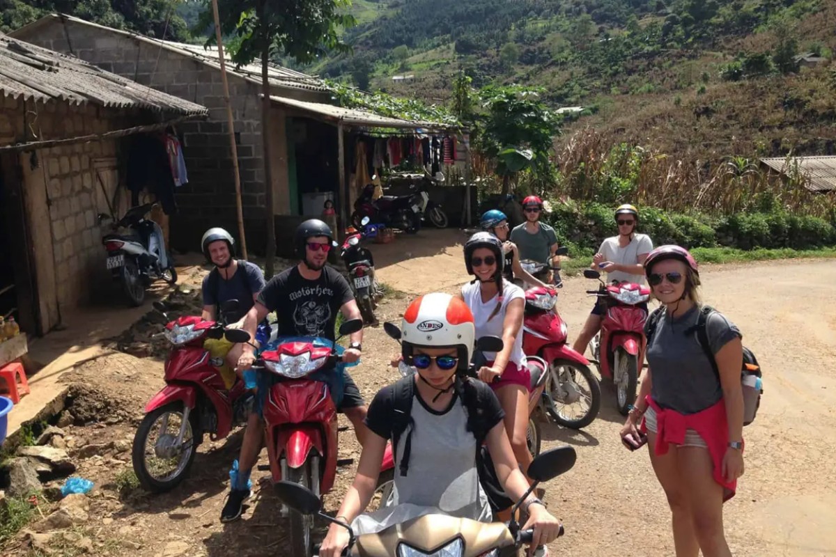 Riding a motorbike to Ta Phin Village