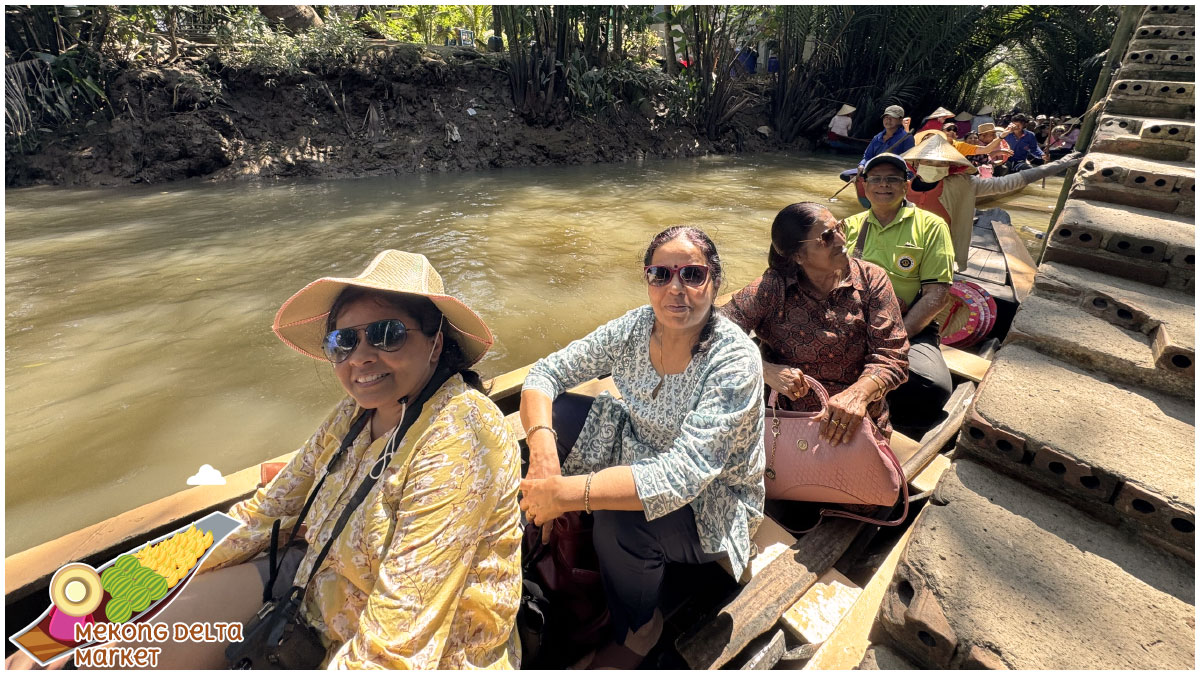 What to Do at Mekong Delta Market - Taking a Sampan Ride Through Narrow Canals