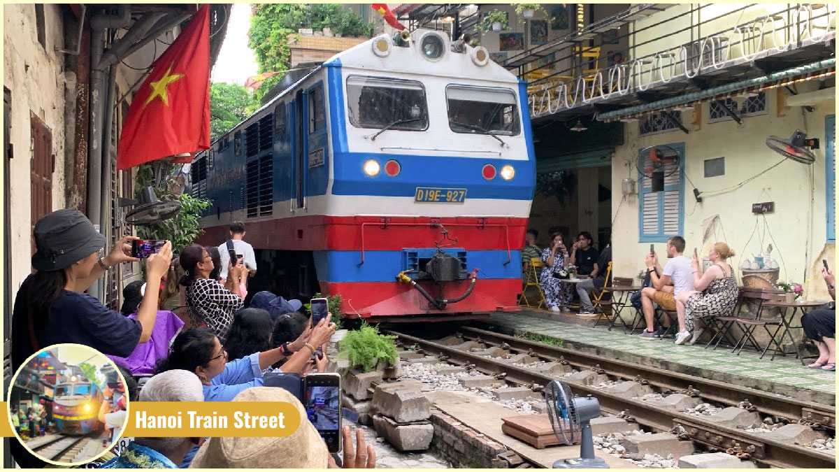 Feel the thrill as the train thunders past at Hanoi Train Street